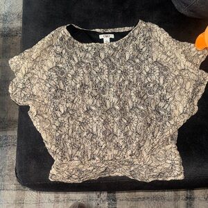 Lace peplum style top